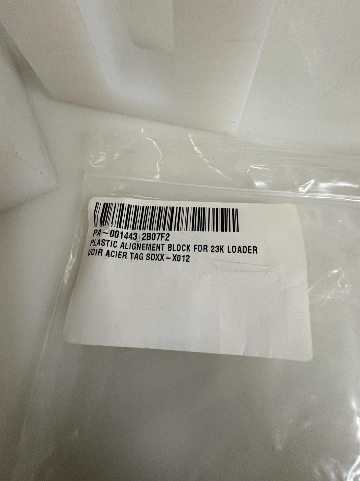 LOT OF 2 PLASTIC ALIGNMENT BLOCK FOR 23K LOADER SDXX-X012