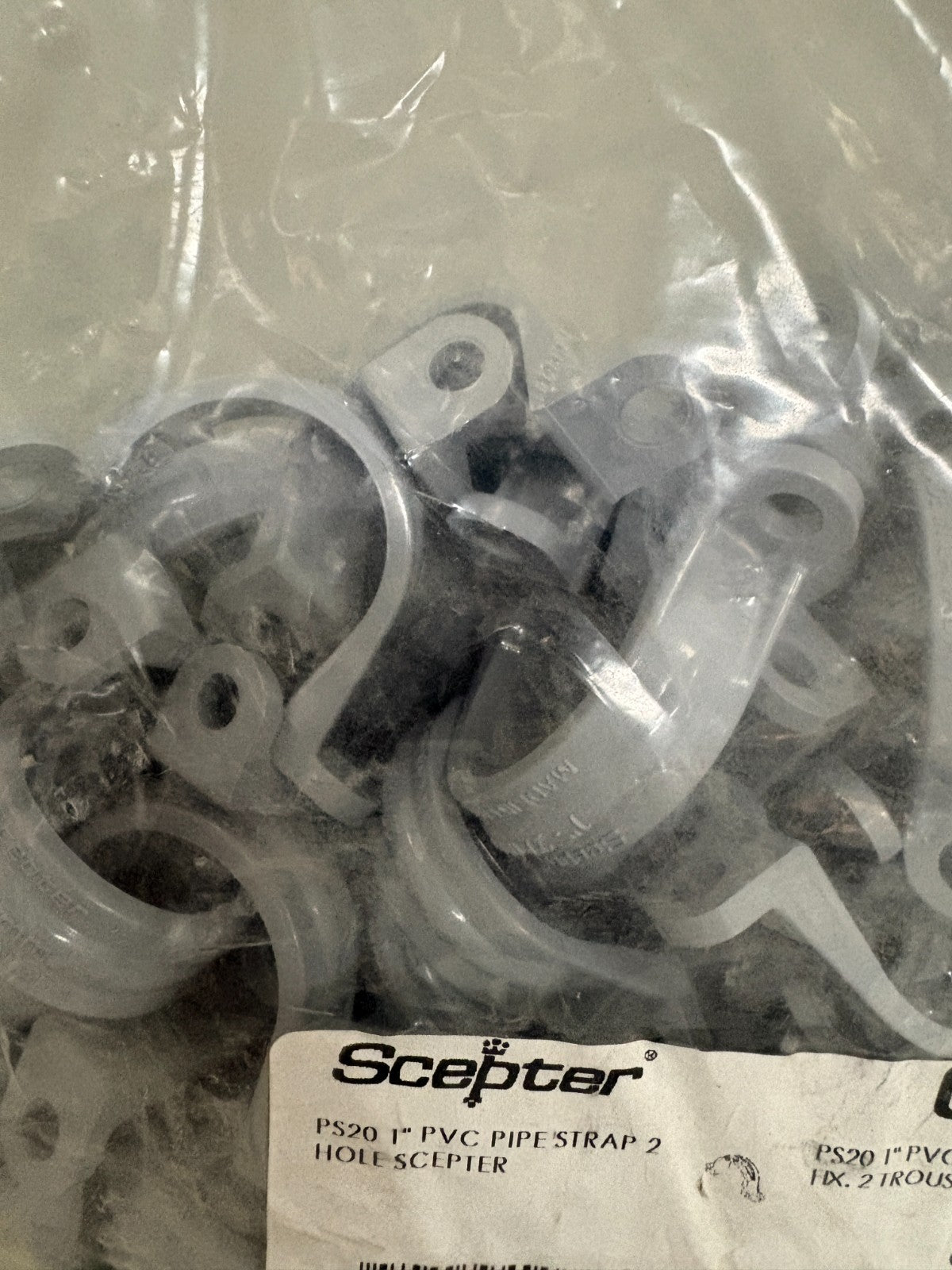 SCEPTER PIPE PS20 1" PVC STRAP 2 HOLE #077813  100 PER BAG2